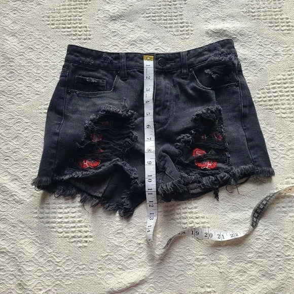 Dex, Distressed Cutoffs with Peekaboo Rose Embroidered Pockets. - Picture 6 of 8